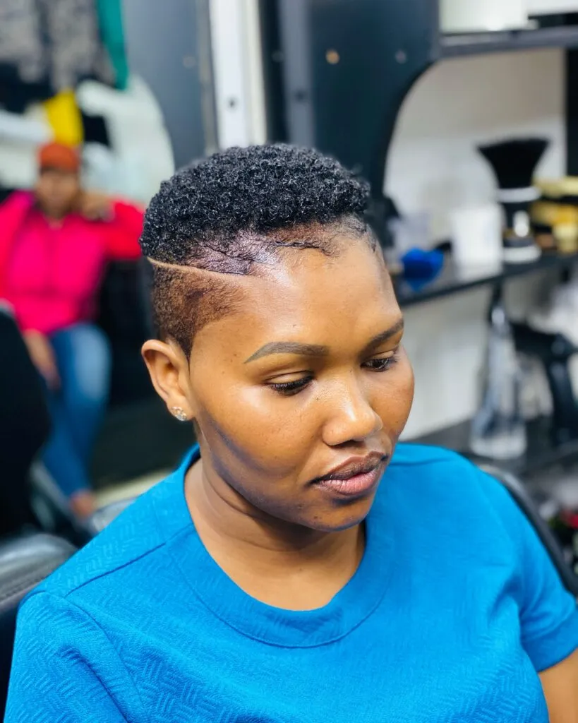 Tapered Cut with Defined Curls and Side Detail