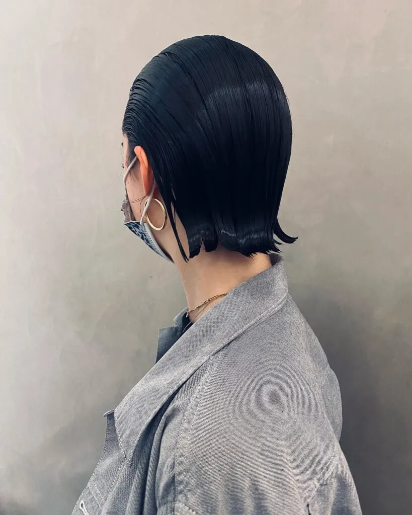 Glossy Slicked-Back Bob with Flipped Ends
