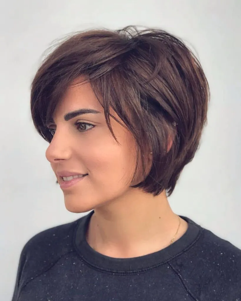 Layered Voluminous Bob with Side-Swept Bangs