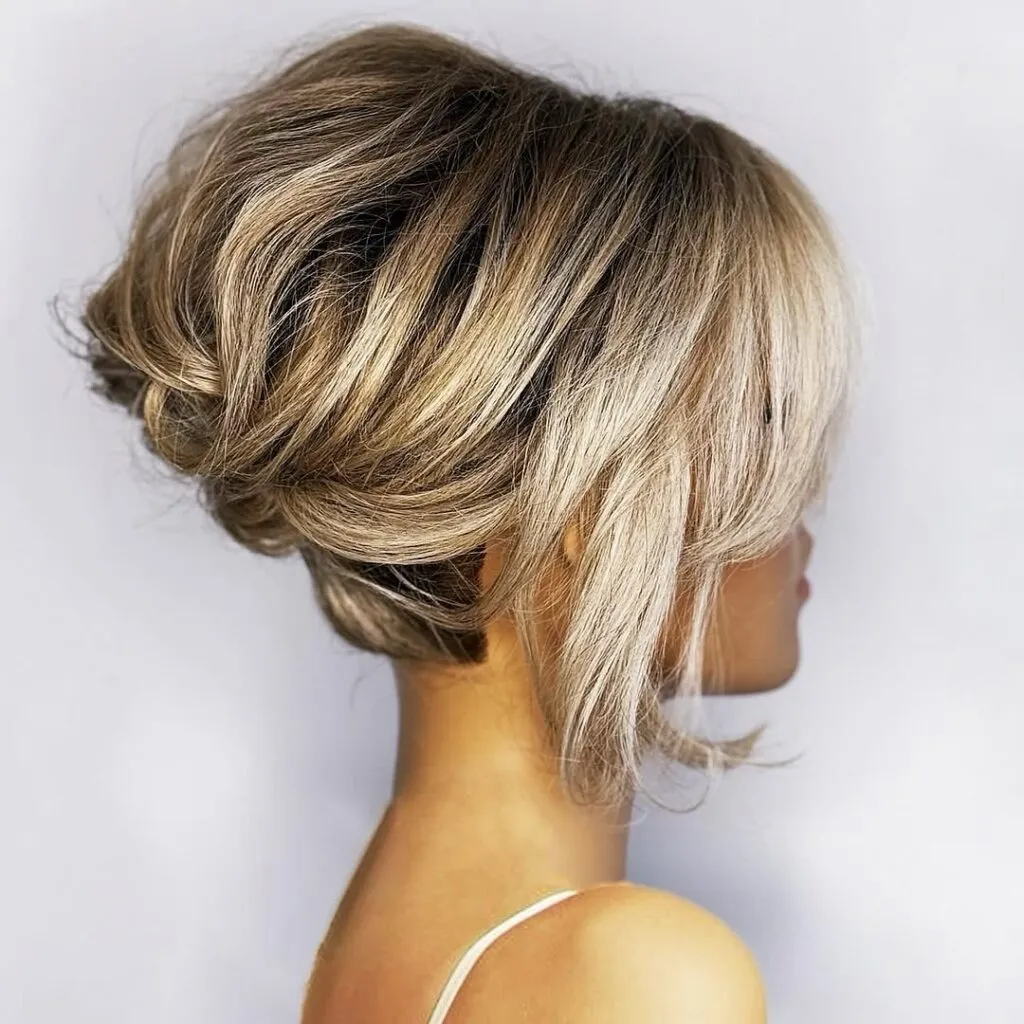 Voluminous Side-Swept French Roll