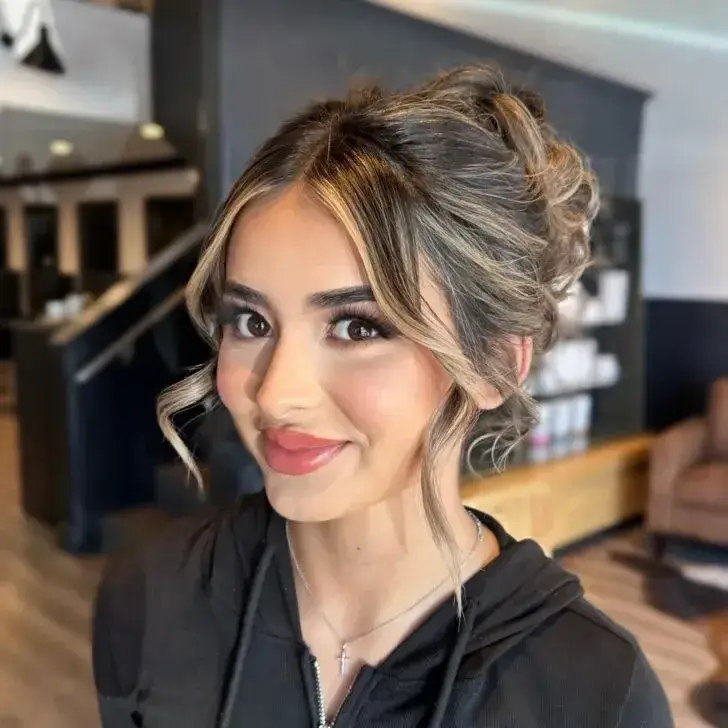 Romantic Loose Updo with Face-Framing Curls Romantic Loose Updo with Face-Framing Curls