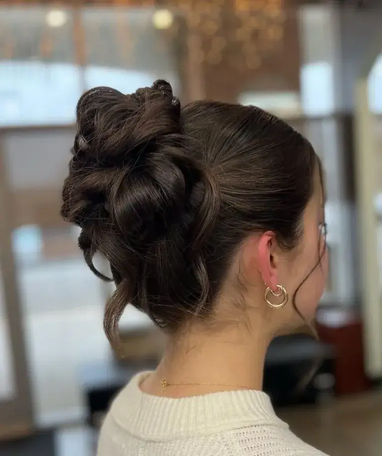 Structured Twisted Bun with Soft Curls Structured Twisted Bun with Soft Curls
